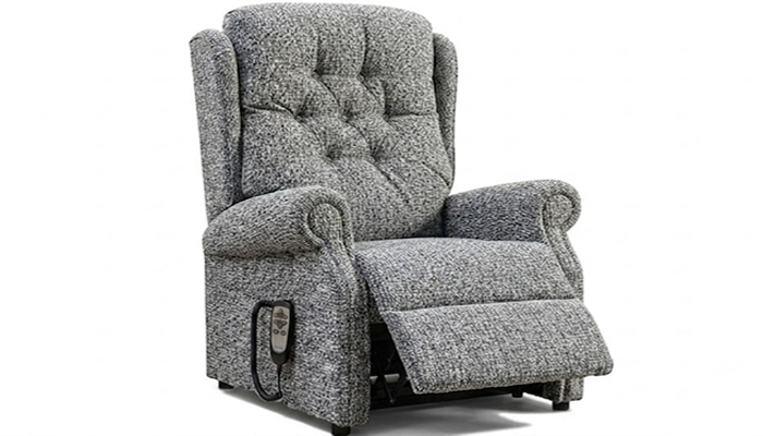 Thirsk Riser Recliner Chair in Grande size with a 23in wide seat and a traditional button back.