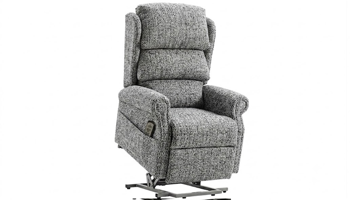 Petite electric riser recliner chair in the fully raised stand-up position.