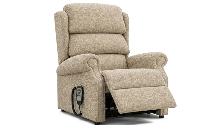 Large electric riser recliner chair in the fully raised stand-up position.
