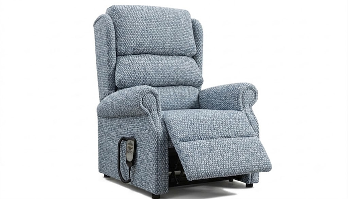 Standard electric riser recliner chair in the fully raised stand-up position.