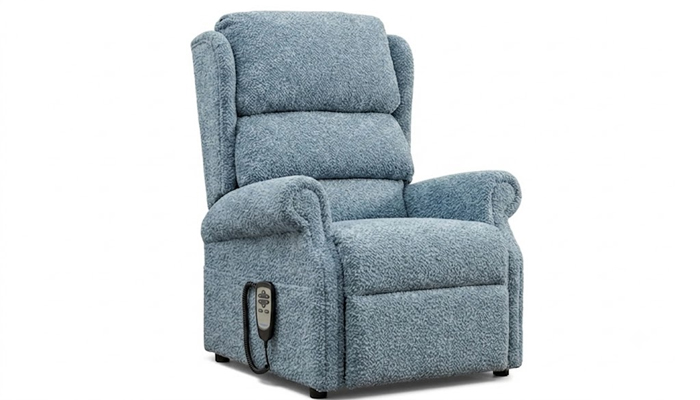 Standard electric riser recliner chair in the fully raised stand-up position.