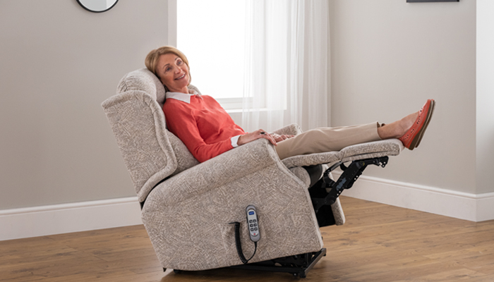 Woburn Petite Cloud Zero Riser Recliner With Model in Part Reclined Position